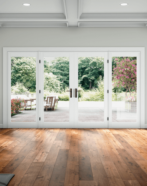 Milgard Tuscany Patio Doors | V400 Series Vinyl Doors In a Beautiful Interior view with White Color in Our Windows Company