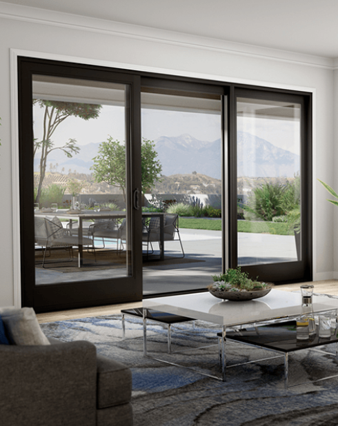 Milgard Ultra Patio Doors | C650 Series Fiberglass Doors In a Beautiful Interior view with Black Color in Our Windows Company